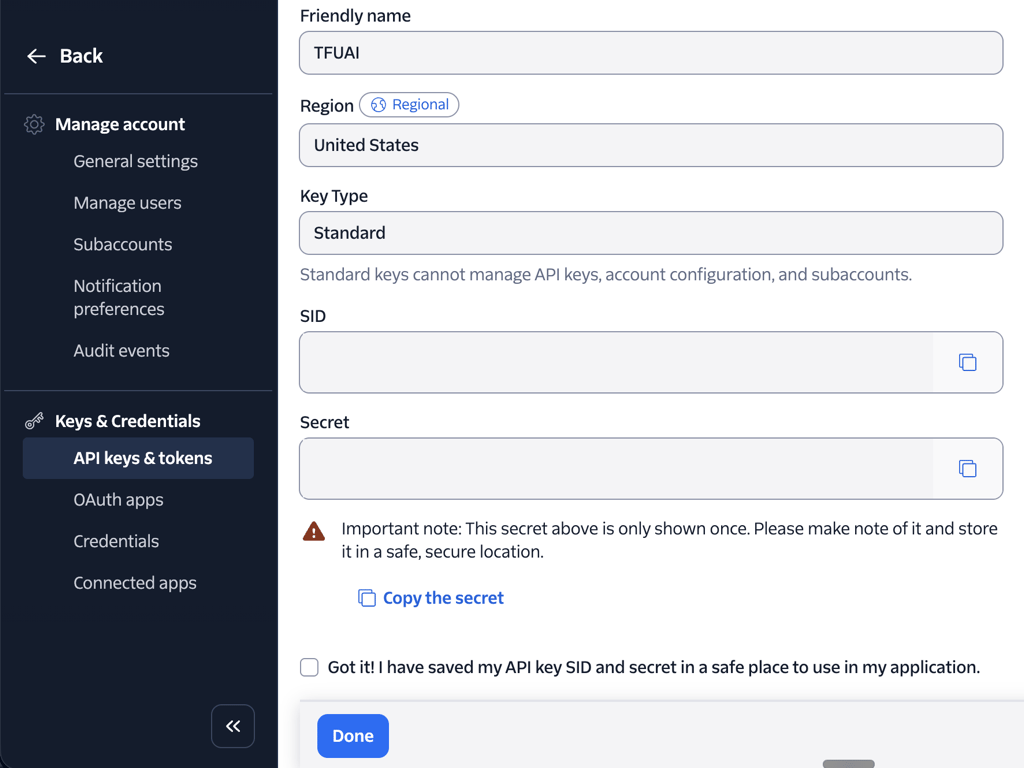 The Twilio Console after a key is created, showing the SID and Secret fields with a copy button on each. Both fields are shown empty here; on your own screen they hold the values to copy.