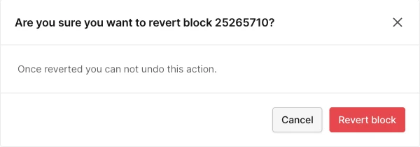 Dialog titled Are you sure you want to revert block 25265710? with the message Once reverted you can not undo this action, and Cancel and Revert block buttons