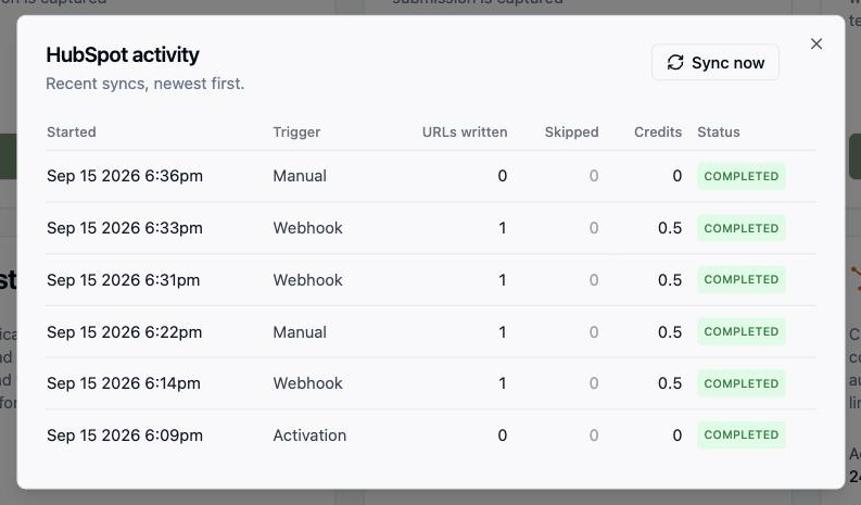 The Activity dialog listing recent syncs and the pages each one wrote.