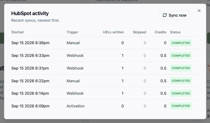 The Activity dialog listing recent syncs and the pages each one wrote.