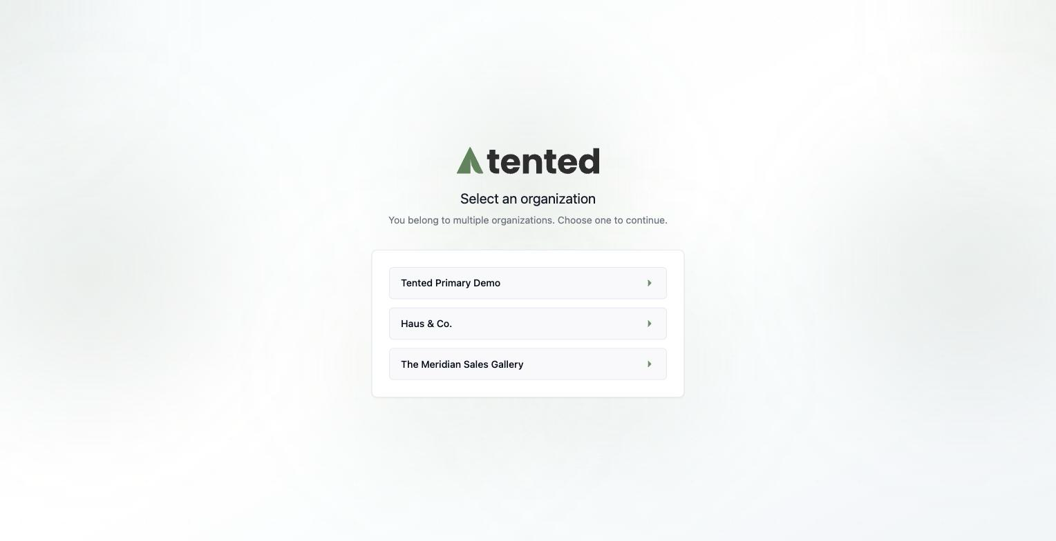 A screenshot of the Select an organization page at login, listing three workspaces to choose from.