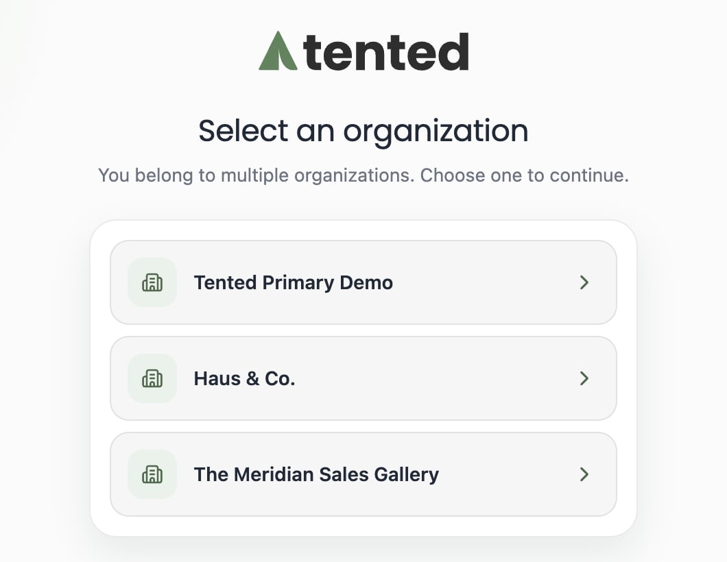 A screenshot of the Select an organization page at login, listing three workspaces to choose from.