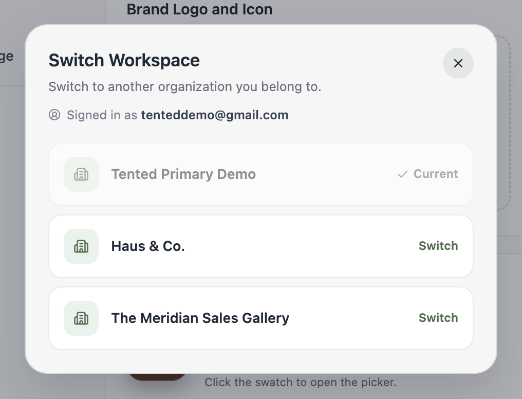 A screenshot of the Switch workspace dialog listing three workspaces, with the current one marked Current and the others offering a Switch button.