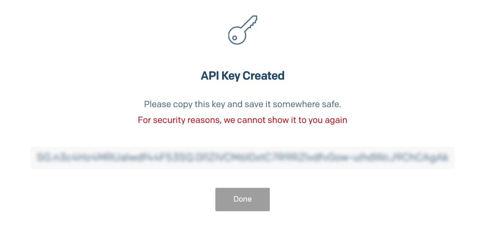 SendGrid 'API Key Created' confirmation screen showing the generated key with a warning that it cannot be shown again.