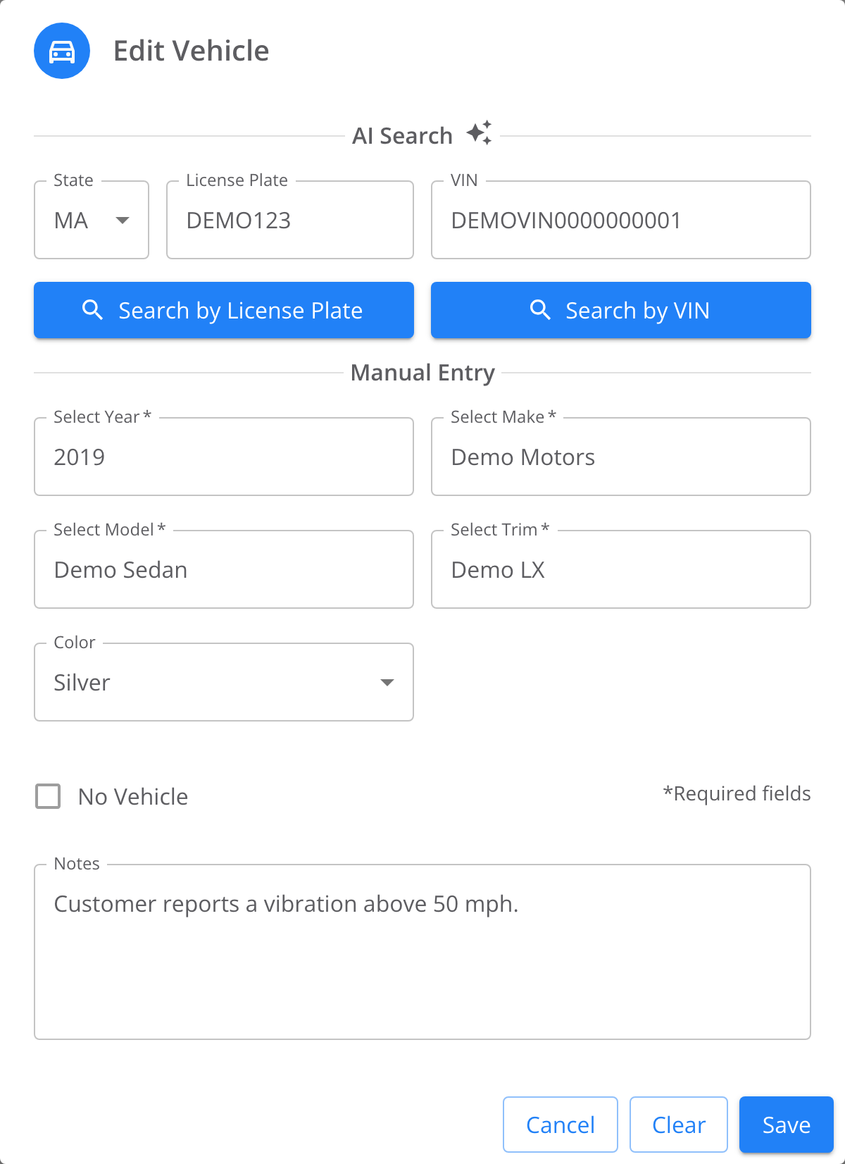 Edit Vehicle dialog with an AI Search section holding State, License Plate and VIN fields plus Search by License Plate and Search by VIN buttons. Manual Entry section with Select Year, Select Make, Select Model, Select Trim and Color filled with demo values. A No Vehicle checkbox, a Notes field, and Cancel, Clear and Save buttons.