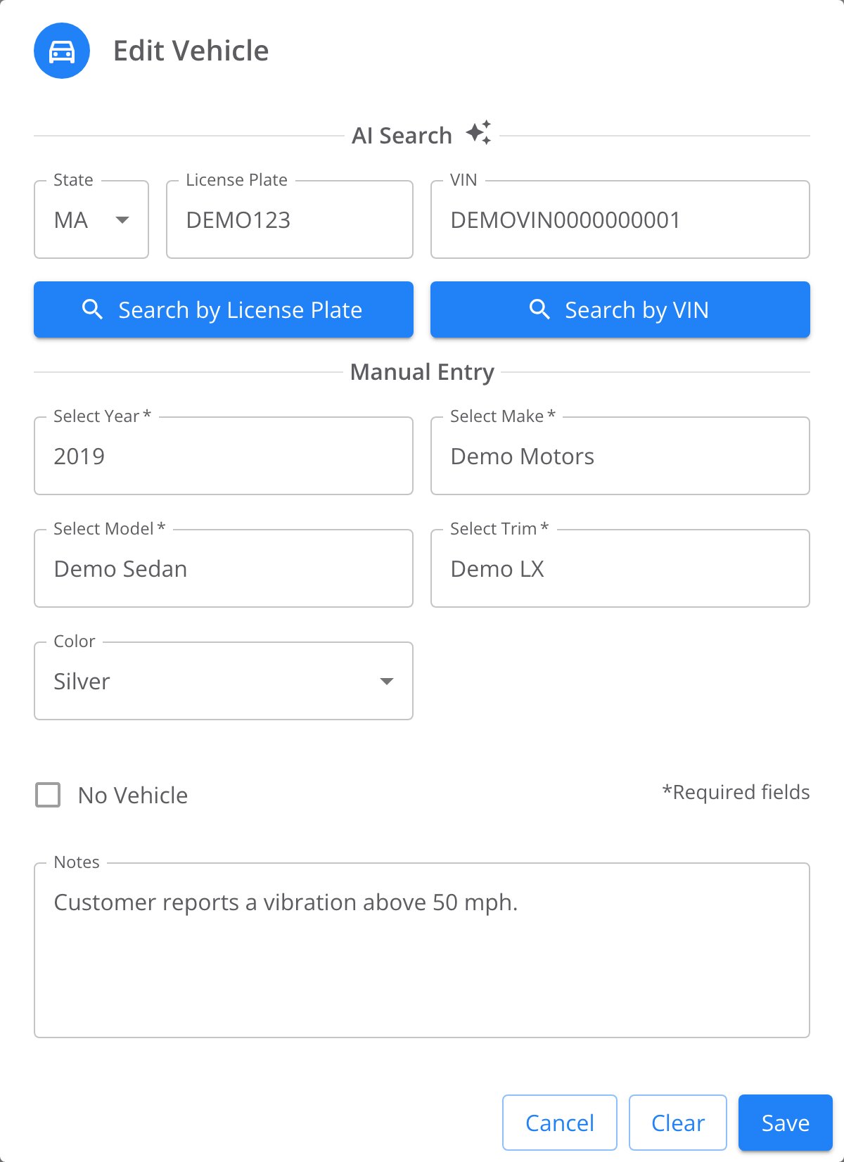 Edit Vehicle dialog with an AI Search section holding State, License Plate and VIN fields plus Search by License Plate and Search by VIN buttons. Manual Entry section with Select Year, Select Make, Select Model, Select Trim and Color filled with demo values. A No Vehicle checkbox, a Notes field, and Cancel, Clear and Save buttons.