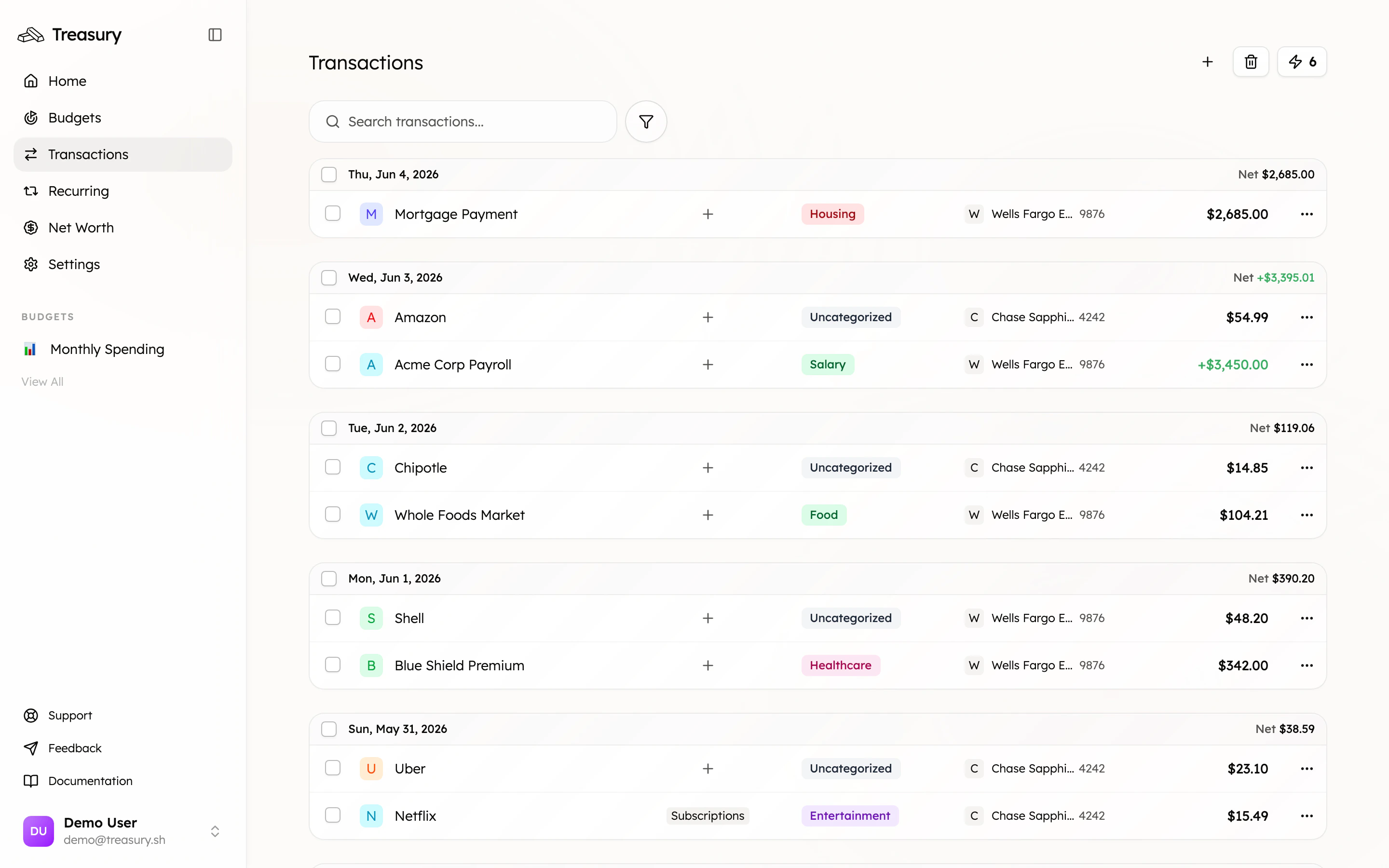 The Transactions page where each transaction shows a category pill you can click to change
