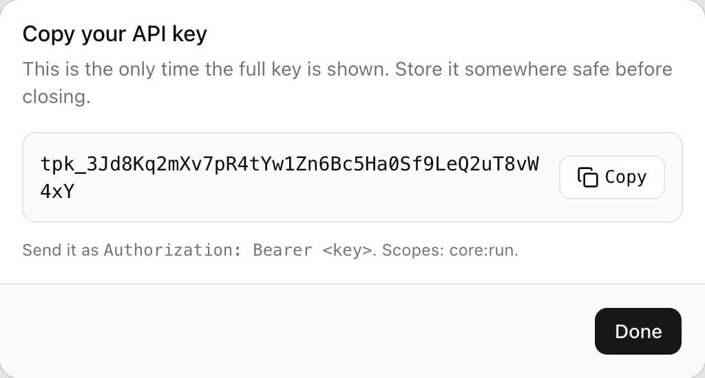 The Copy your API key dialog showing a key beginning tpk_ with a Copy button, the note Send it as Authorization: Bearer <key>, and a Done button.