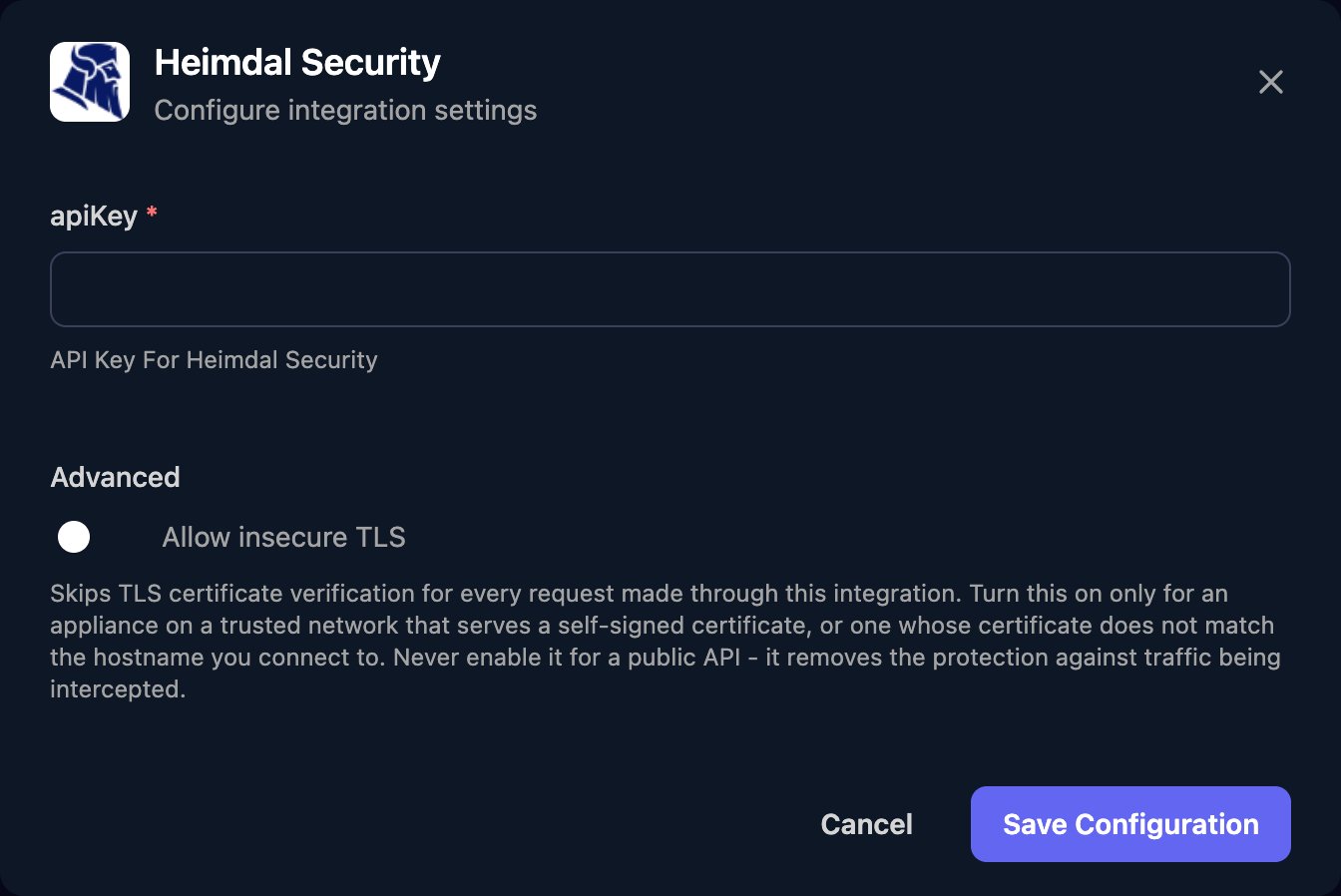 The Heimdal Security configuration window with an apiKey field, an Allow insecure TLS switch under Advanced, and a Save Configuration button.