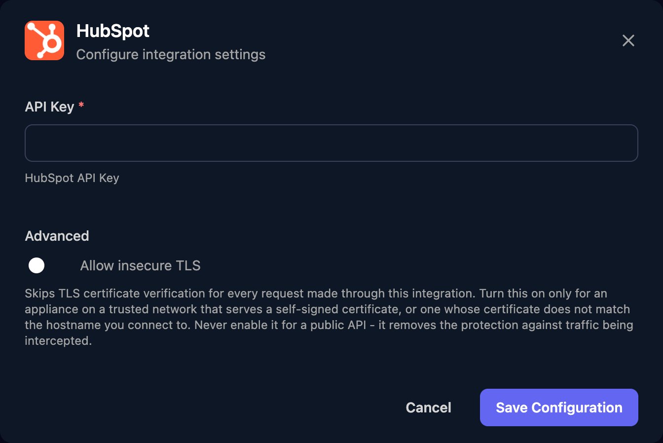 The HubSpot configuration window with an API Key field, an Allow insecure TLS switch under Advanced, and a Save Configuration button.