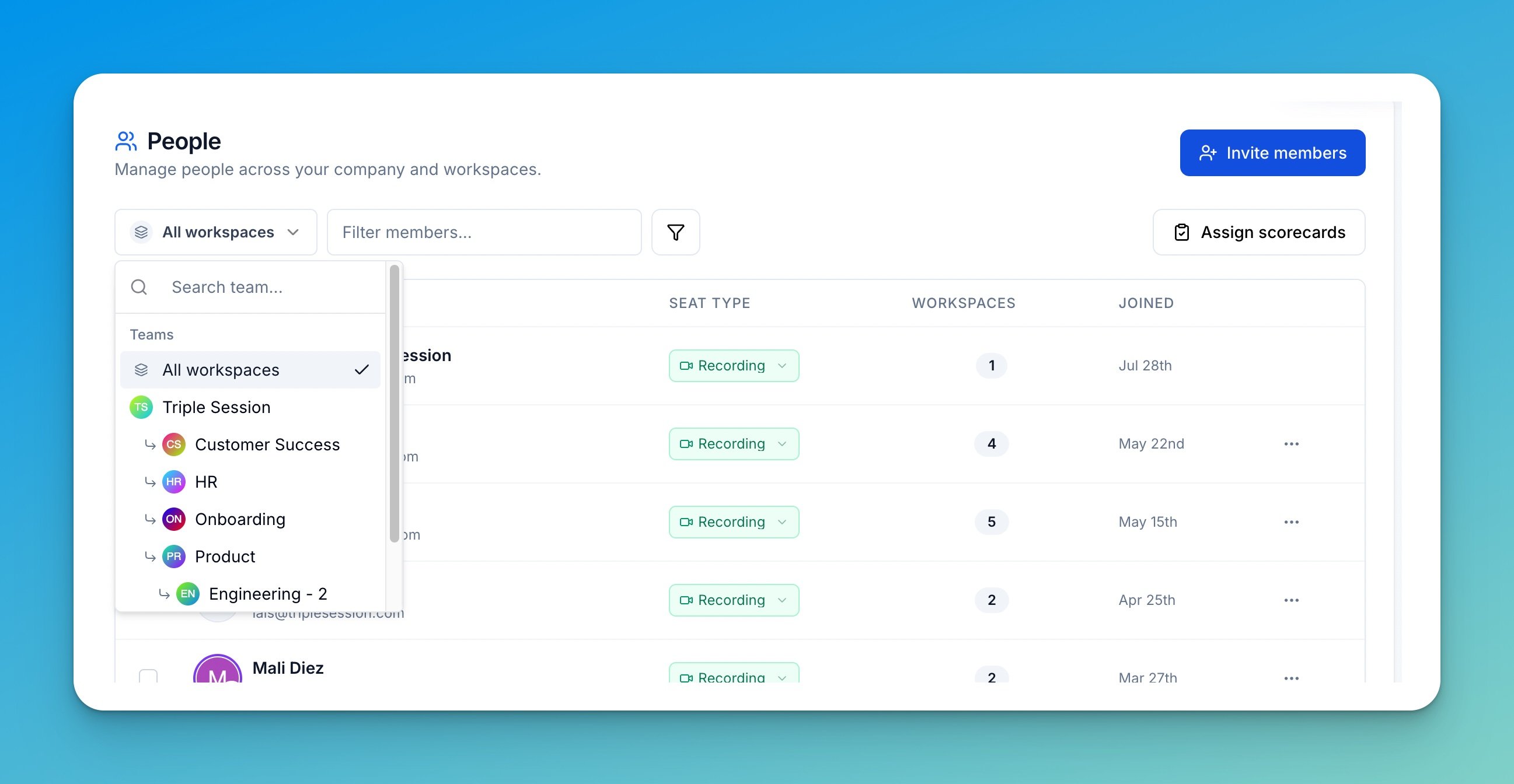 People page with the workspace selector open, listing All workspaces and the company's workspaces