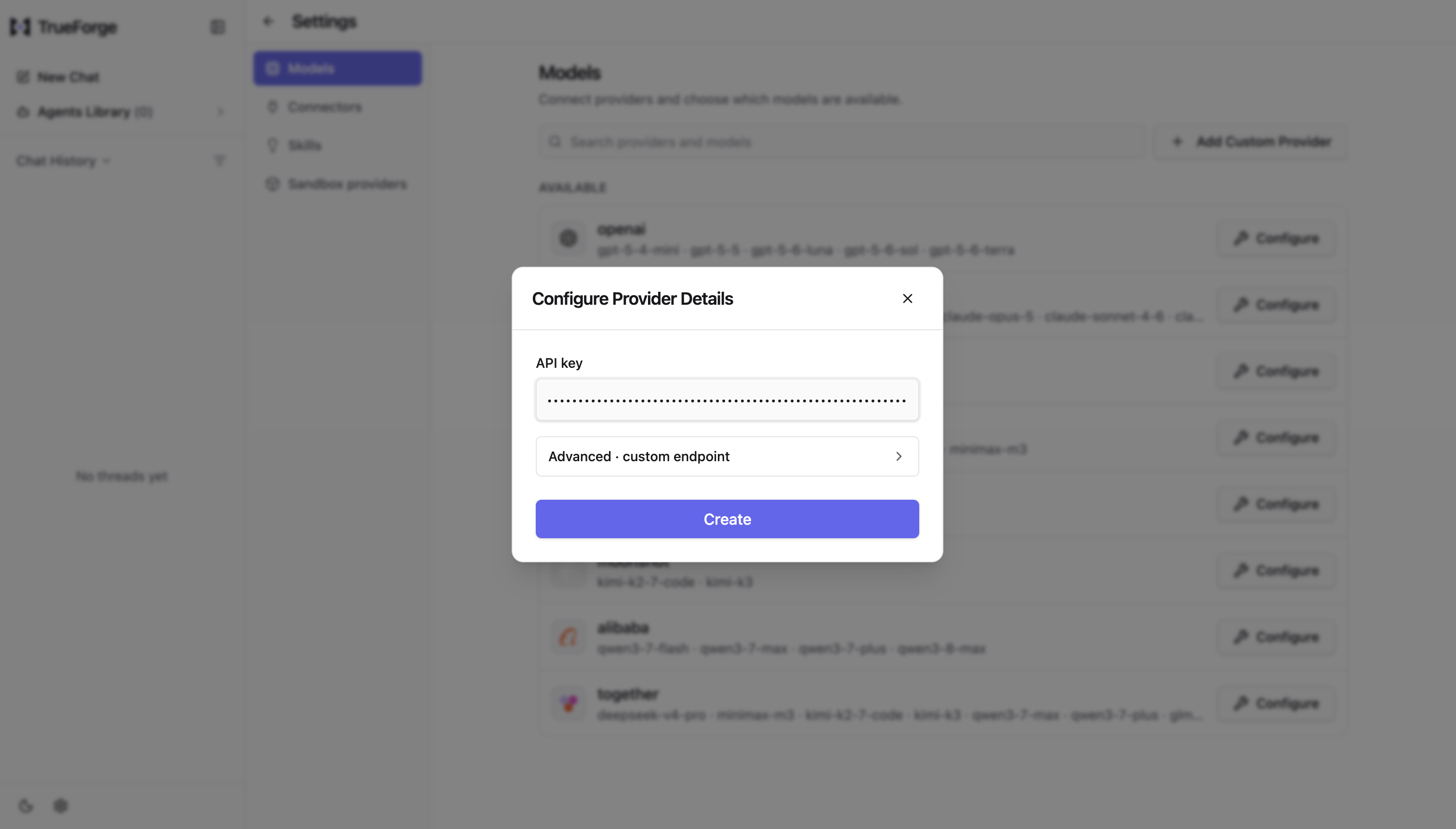 The Configure Provider Details dialog with an API key field and a collapsed Advanced custom endpoint section