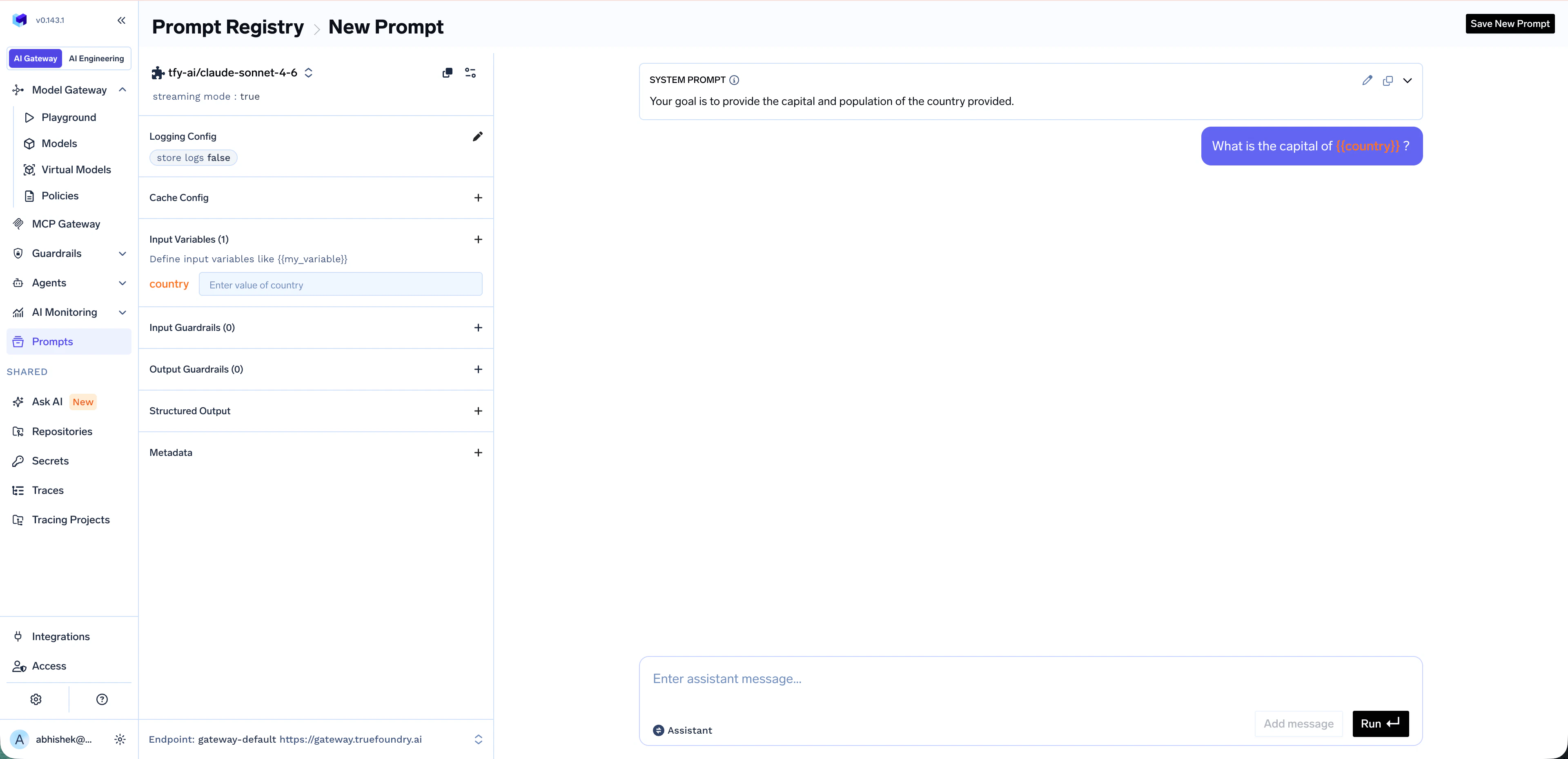 New Prompt screen with a system message about providing capital and population, a user message containing the {country} variable, and the Input Variables panel showing the auto-detected country variable