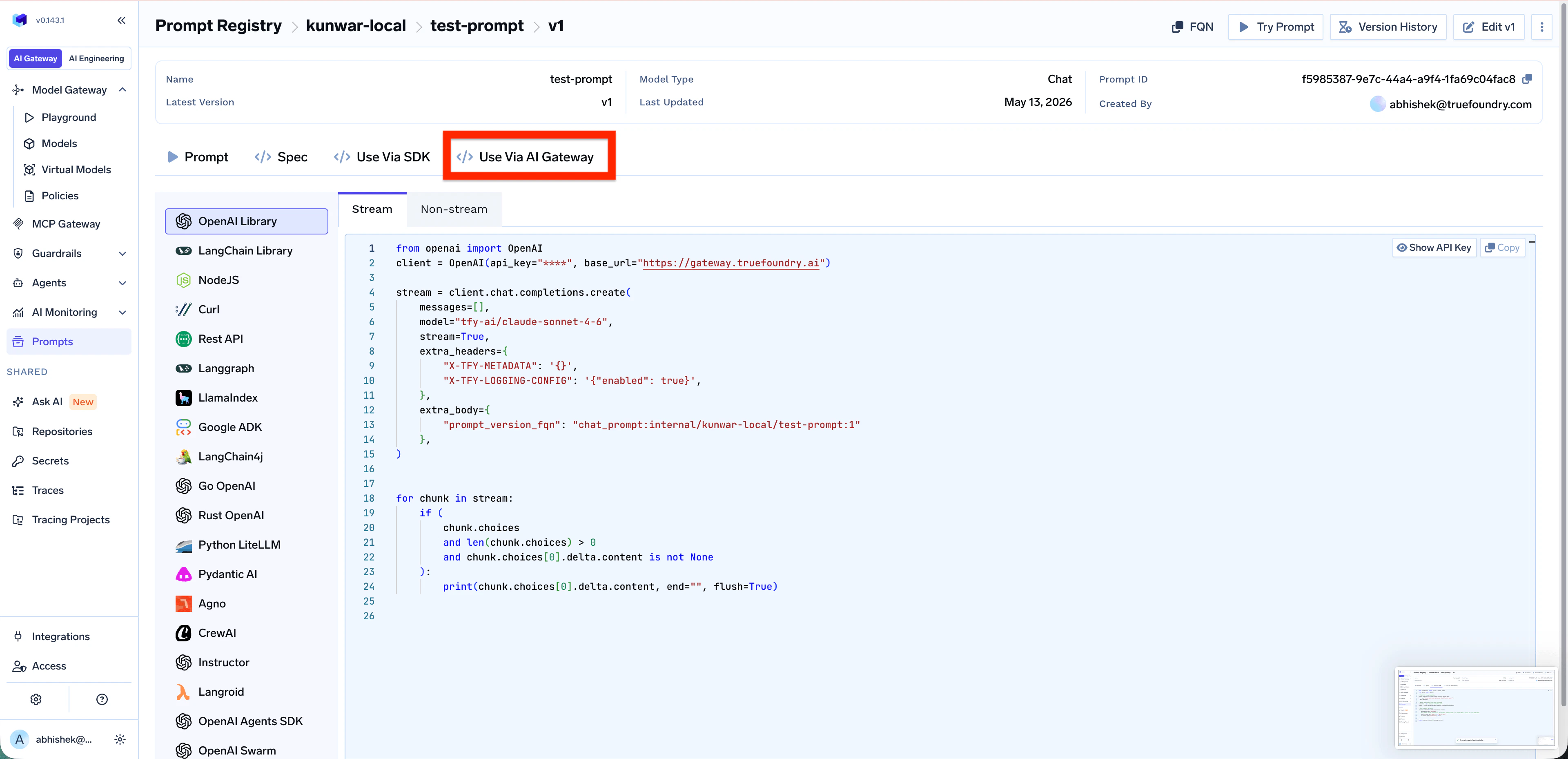 Use Via AI Gateway tab showing Python OpenAI client code calling client.chat.completions.create with prompt_version_fqn in extra_body, alongside a left-side library picker including OpenAI, LangChain, Node.js, Curl, REST, and more