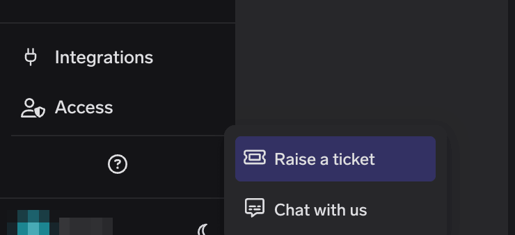 TrueFoundry UI with the Support menu expanded showing Raise a ticket and Chat with us options