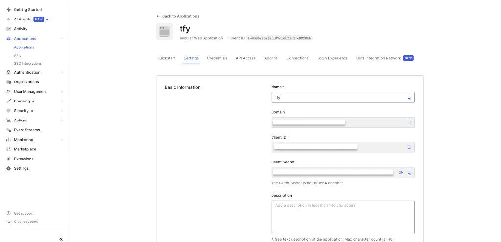 Auth0 application Settings tab showing Basic Information with Domain, Client ID, and Client Secret fields