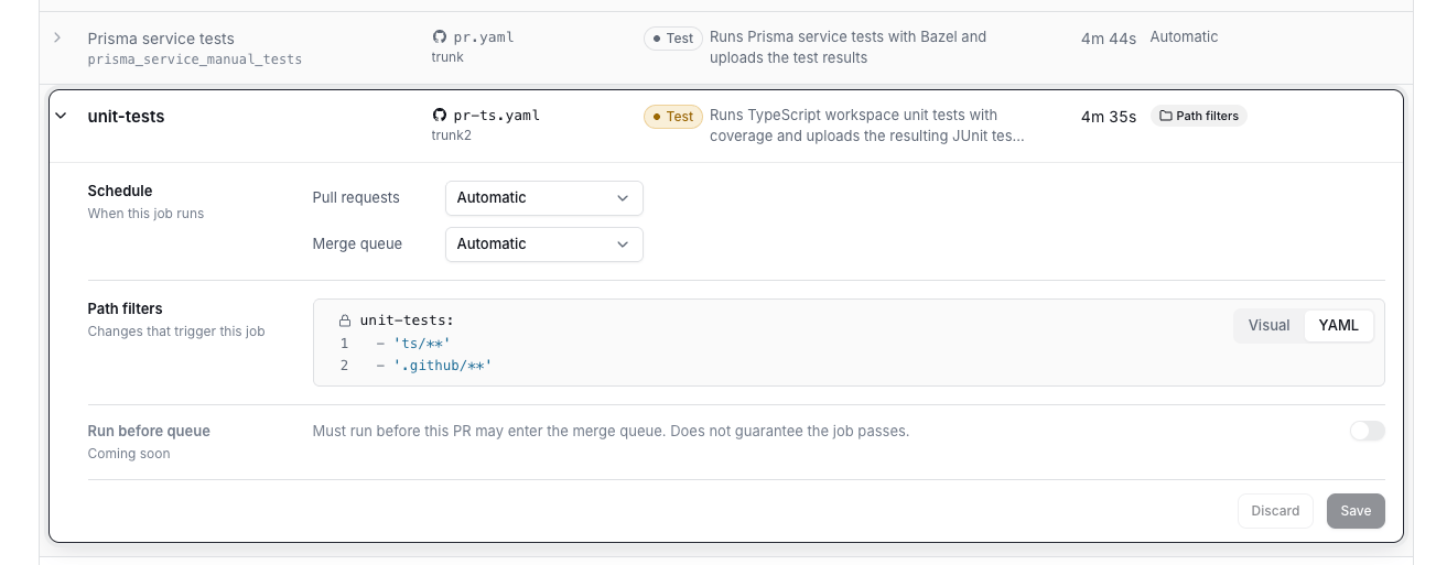 An expanded job in the Configuration tab showing Schedule settings for Pull requests and Merge queue, a Path filters editor in YAML view, and a Run before queue toggle marked Coming soon.
