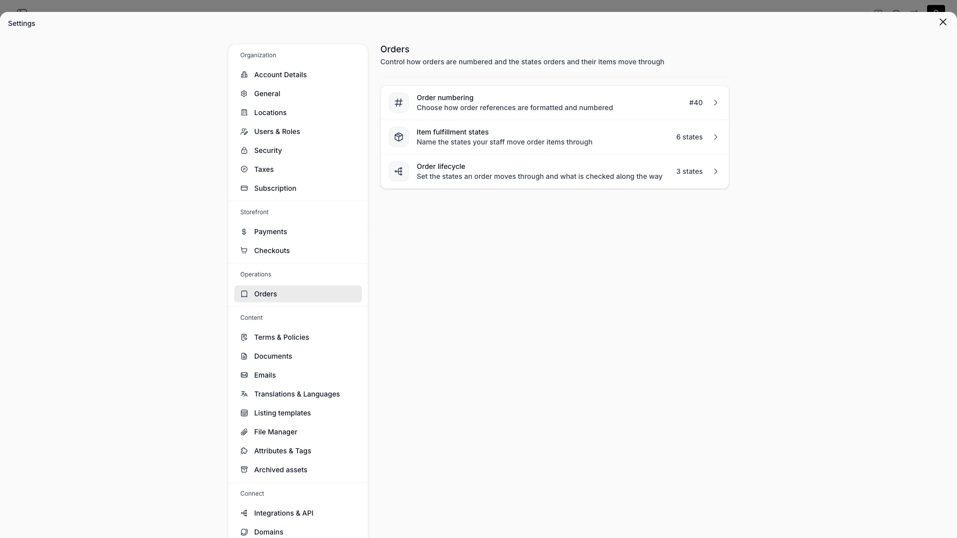 Orders settings index with three rows: Order numbering, Item fulfillment states, and Order lifecycle, each with its summary