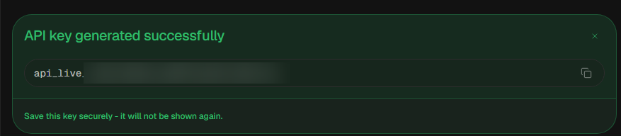 The API key generated successfully banner with the new api_live key, a copy button, and the note that it will not be shown again