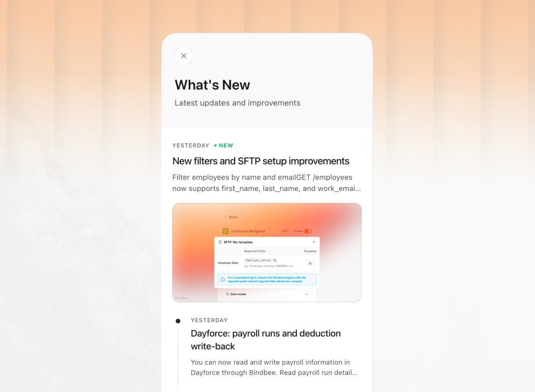 The What's New panel listing recent platform changes, each dated - new employee filters and SFTP setup improvements marked NEW, and Dayforce payroll runs and deduction write-back