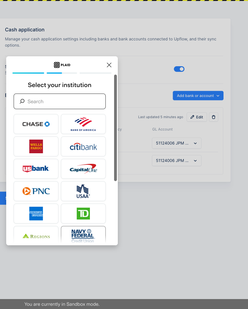 The Plaid institution selection screen showing a list of banks to connect.
