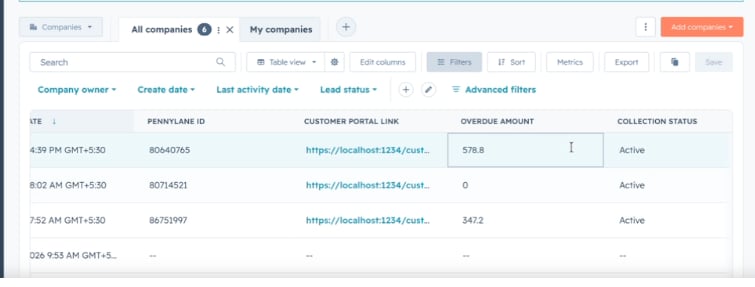 A HubSpot company list showing the customer portal link, overdue amount, and collection status exported from Upflow.