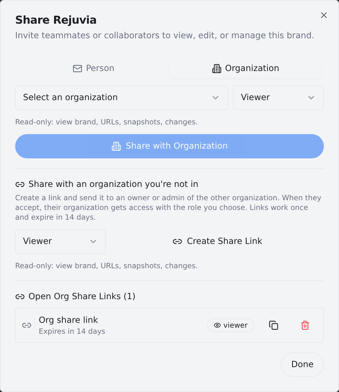 The Share modal on the Organization tab, showing the share link section with a role picker, a Create Share Link button, and one open share link with copy and revoke buttons.