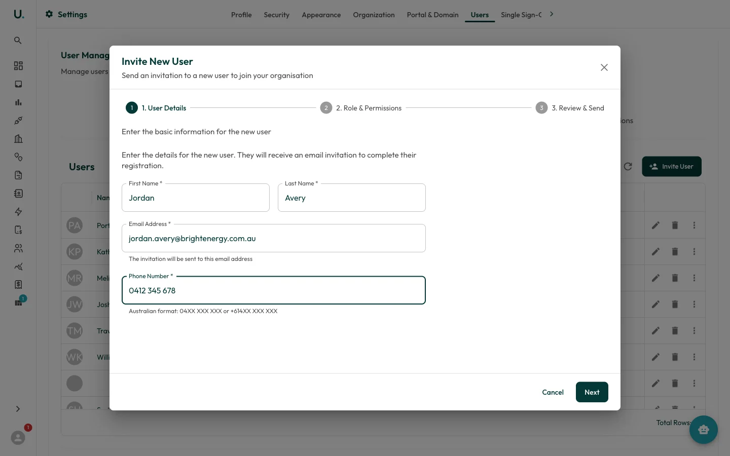 Invite New User wizard on the User Details step with name, email, and phone fields