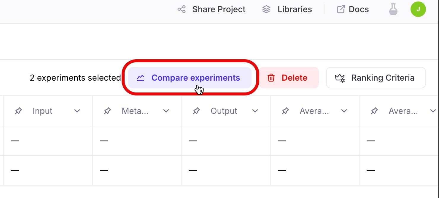 The compare experiments button, above the rows of experiments