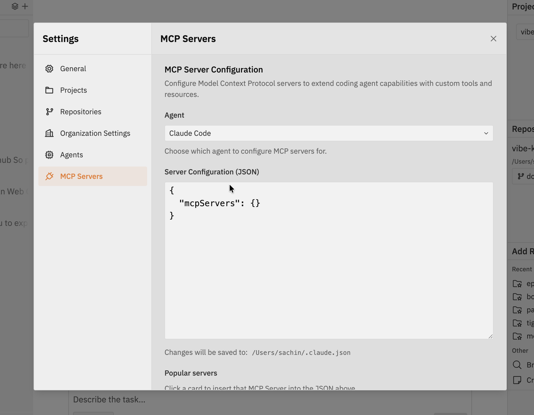 MCP Server configuration page showing agent selection, JSON configuration, and popular servers