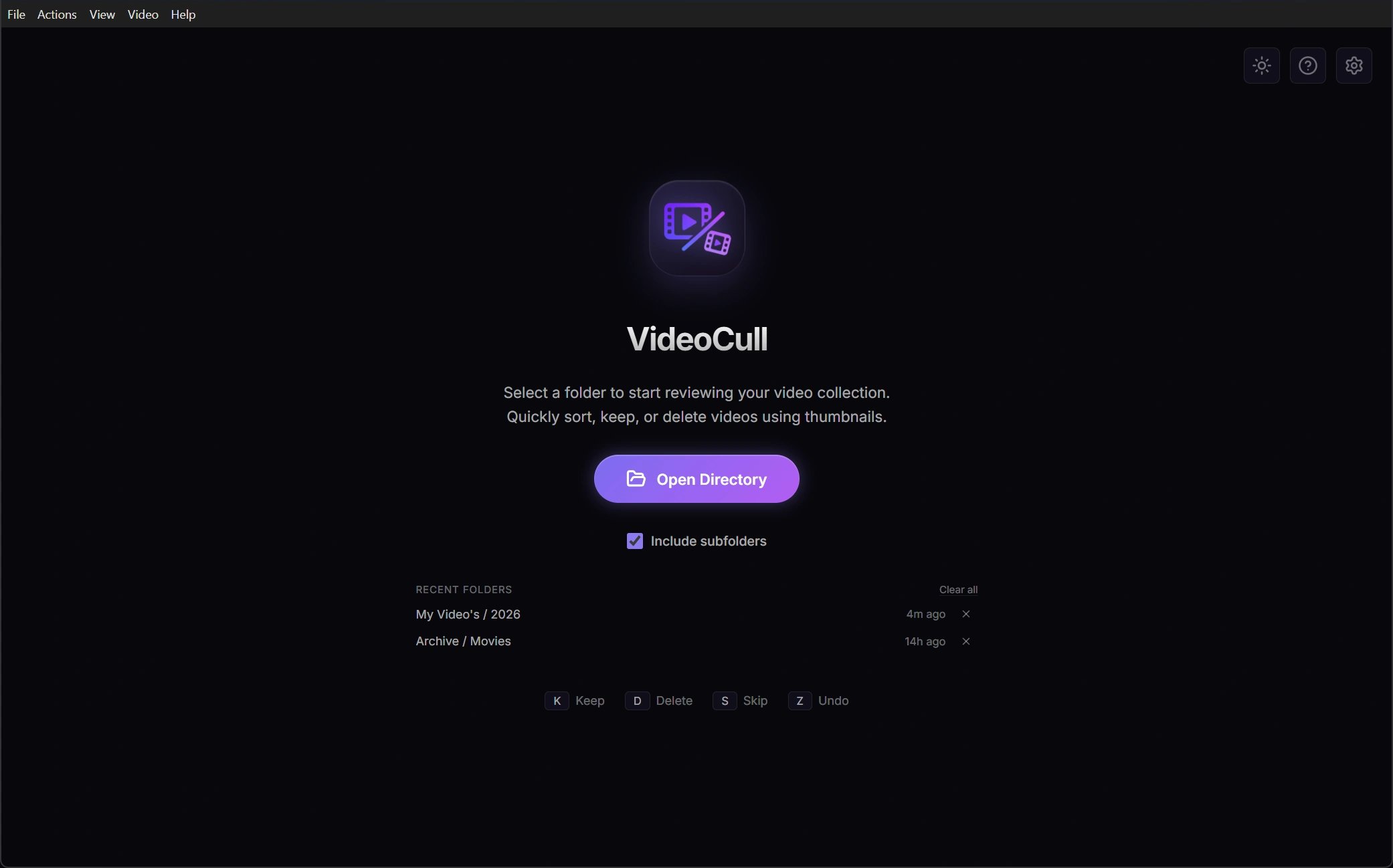 VideoCull empty state with the Open Directory button, recent folders, theme controls, and default review shortcuts