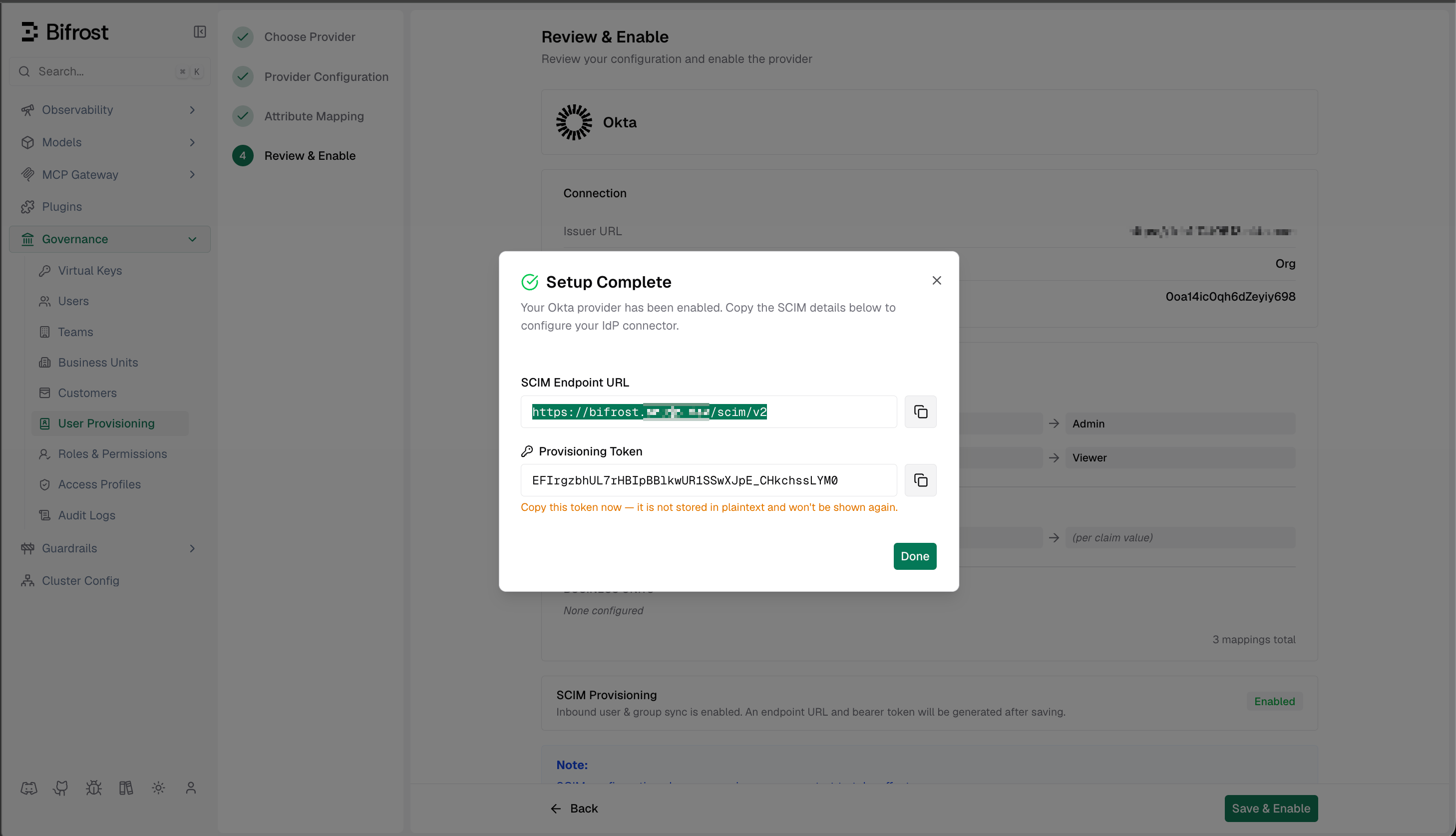 Vikat Setup Complete dialog displaying the SCIM Endpoint URL and one-time Provisioning Token