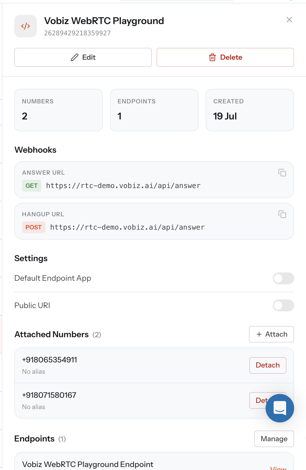 Vobiz WebRTC Playground application detail panel showing the application ID, a GET answer URL and POST hangup URL pointing at rtc-demo.vobiz.ai/api/answer, and an Attached Numbers section listing two Indian DIDs with an Attach button