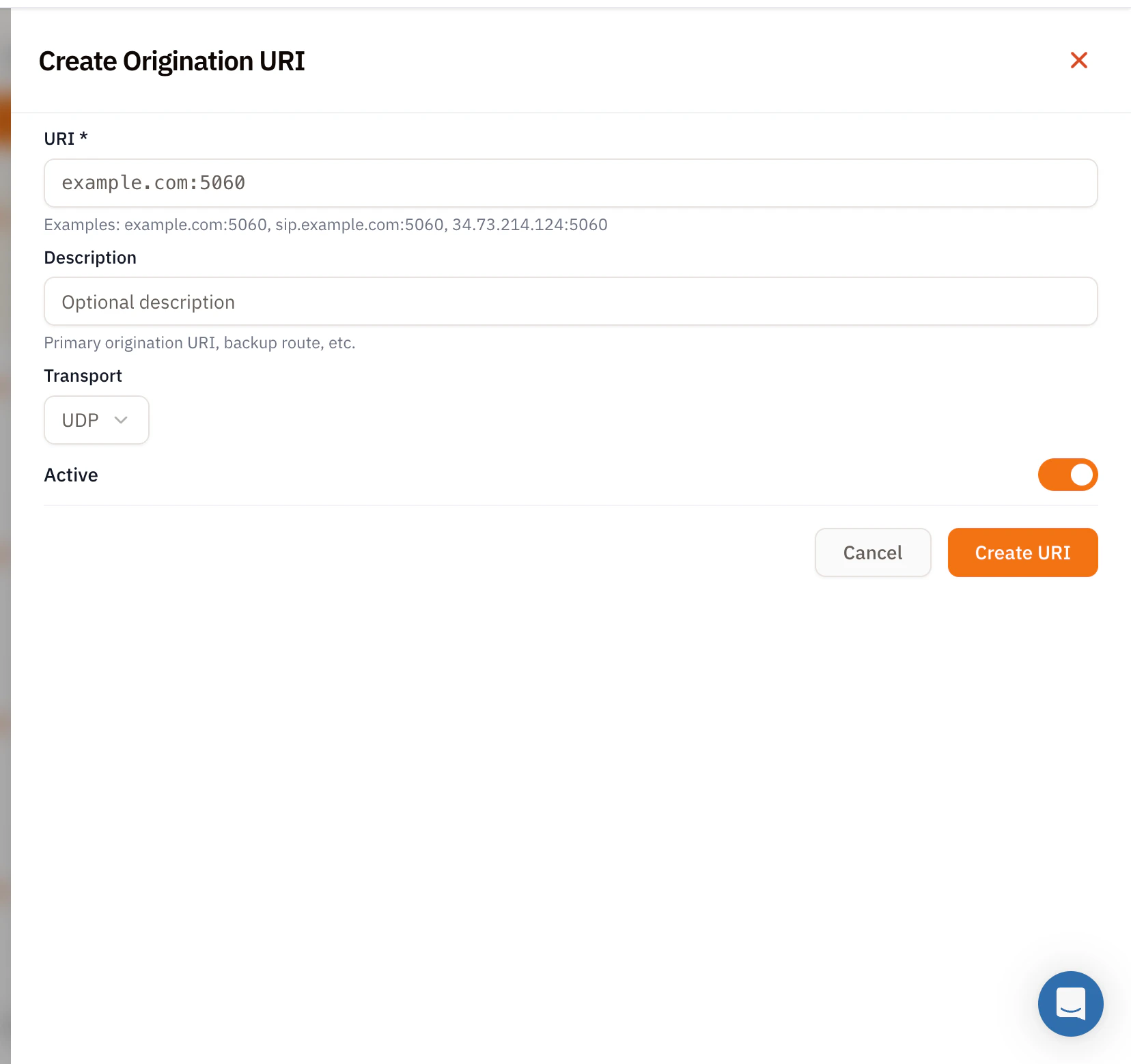 Create Origination URI modal with URI required field (placeholder example.com:5060) and hint Examples example.com:5060 sip.example.com:5060 34.73.214.124:5060, Description field with placeholder Optional description and hint Primary origination URI backup route etc., Transport dropdown set to UDP, Active toggle on, and Cancel and orange Create URI buttons