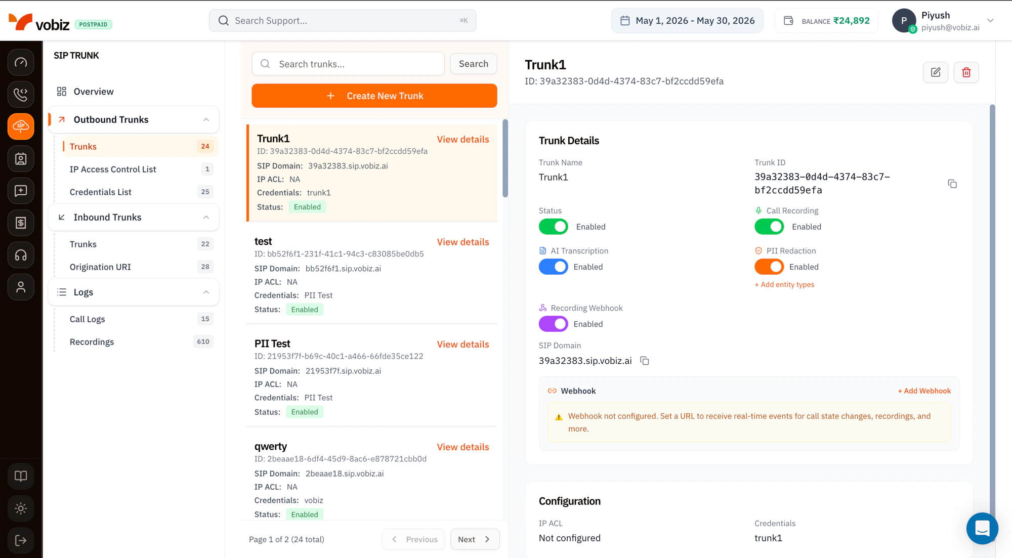 Outbound Trunks page with a searchable list of trunks (Trunk1, test, PII Test, qwerty) showing ID, SIP Domain, IP ACL, Credentials, and Status, and a Trunk Details panel with Trunk Name, Trunk ID, Status toggle, Call Recording, AI Transcription, PII Redaction, Recording Webhook toggles, SIP Domain field, and a Webhook section