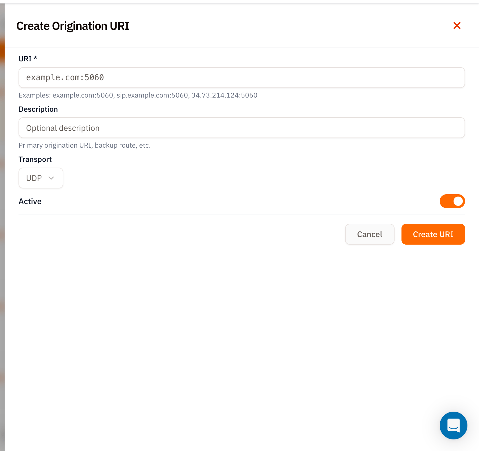 Create Origination URI modal with URI required field (placeholder example.com:5060) and hint Examples example.com:5060 sip.example.com:5060 34.73.214.124:5060, Description field with placeholder Optional description and hint Primary origination URI backup route etc., Transport dropdown set to UDP, Active toggle on, and Cancel and orange Create URI buttons