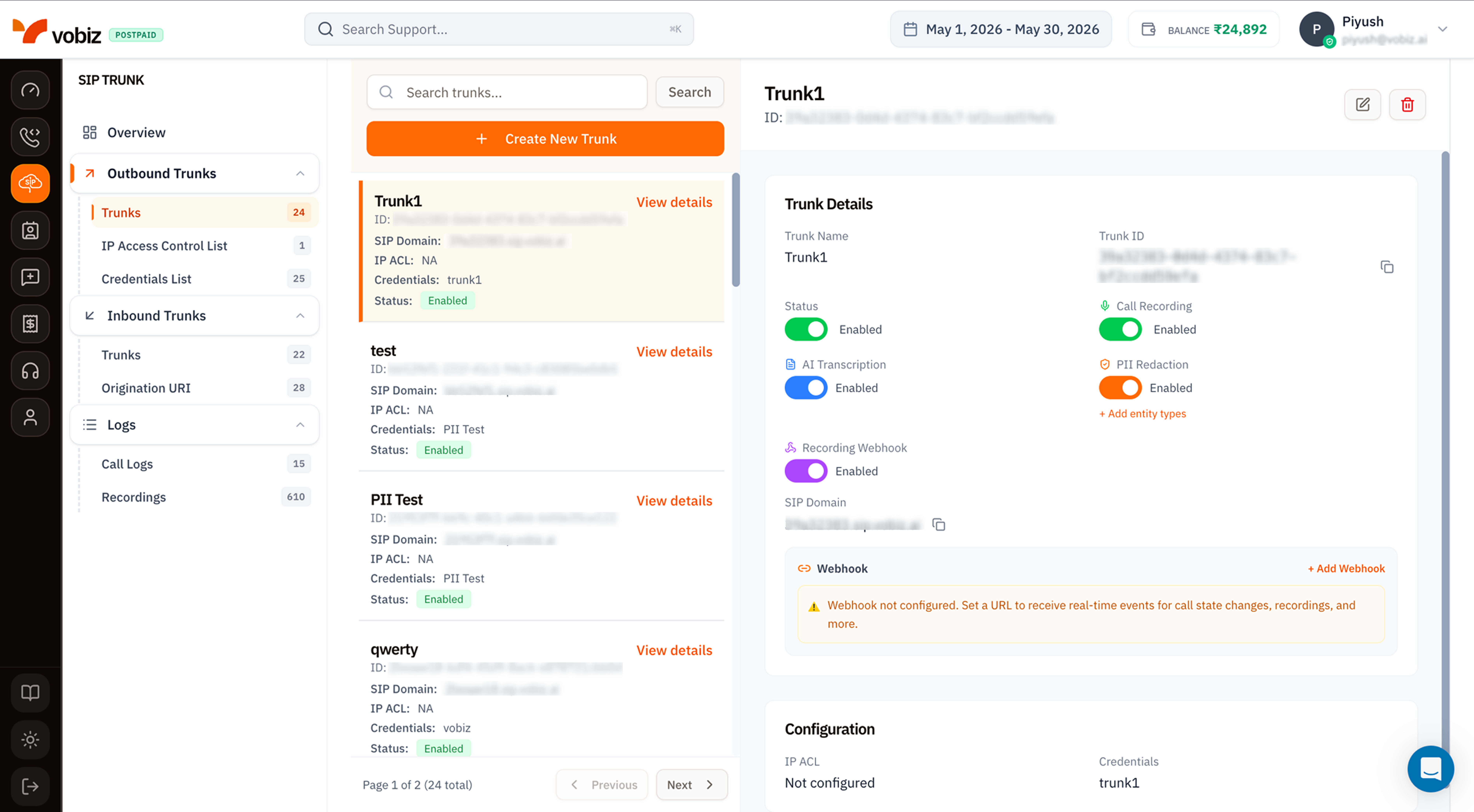 Outbound Trunks page with a searchable list of trunks (Trunk1, test, PII Test, qwerty) showing ID, SIP Domain, IP ACL, Credentials, and Status, and a Trunk Details panel with Trunk Name, Trunk ID, Status toggle, Call Recording, AI Transcription, PII Redaction, Recording Webhook toggles, SIP Domain field, and a Webhook section
