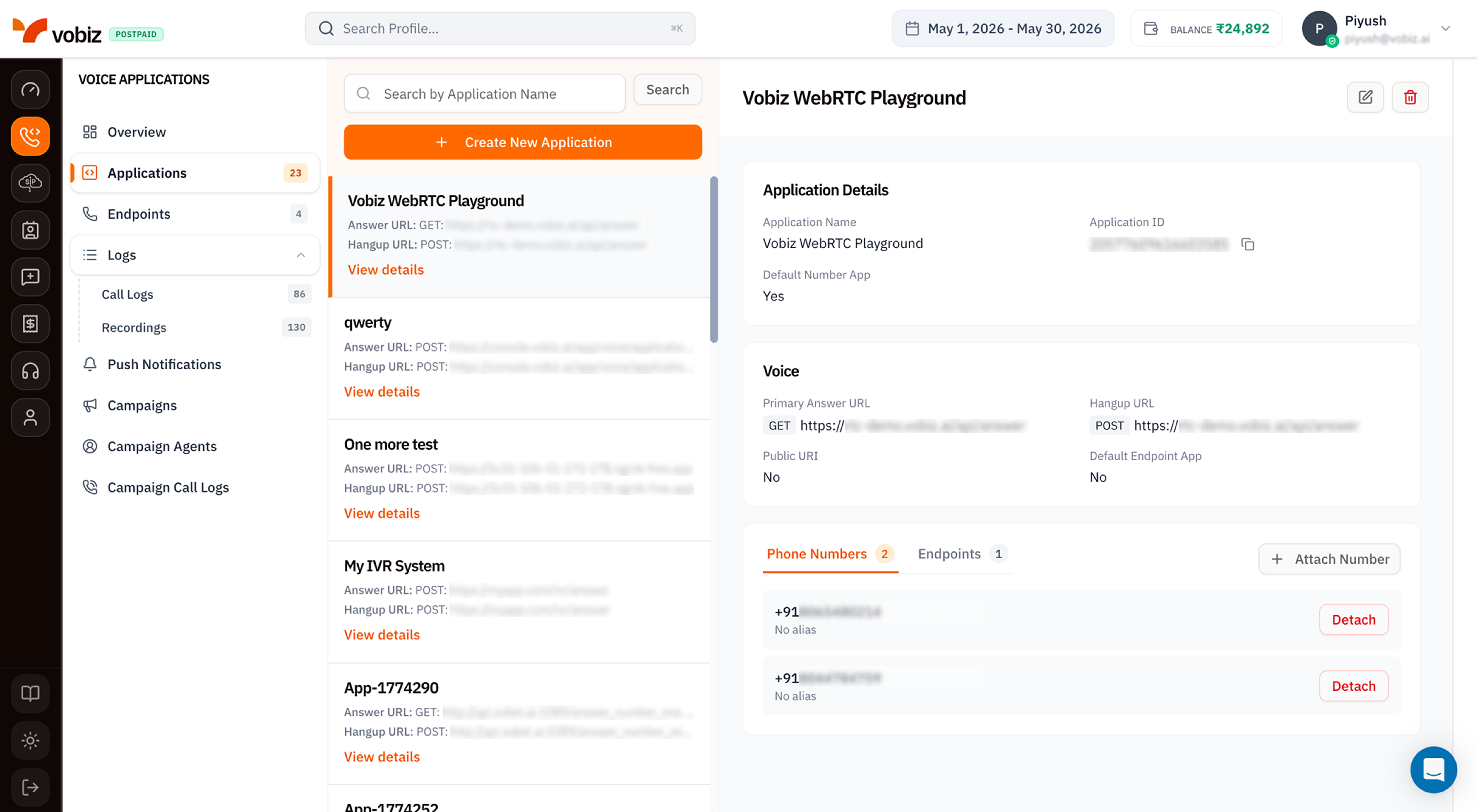 Voice Applications page split into three columns - the navigation sidebar on the left, a searchable list of XML applications in the middle showing apps like Vobiz WebRTC Playground and qwerty, and an Application Details panel on the right showing Application ID, Answer URL, Hangup URL, attached phone numbers, and endpoints