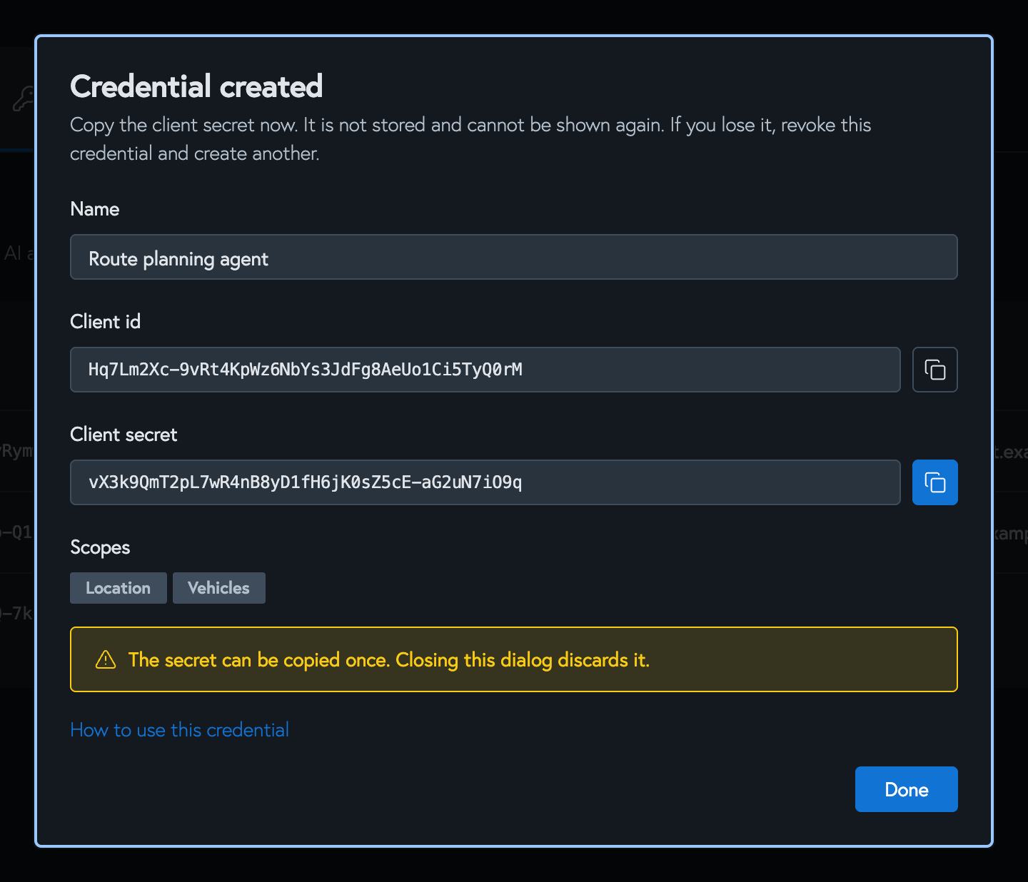 The Credential created dialog showing the client ID and client secret