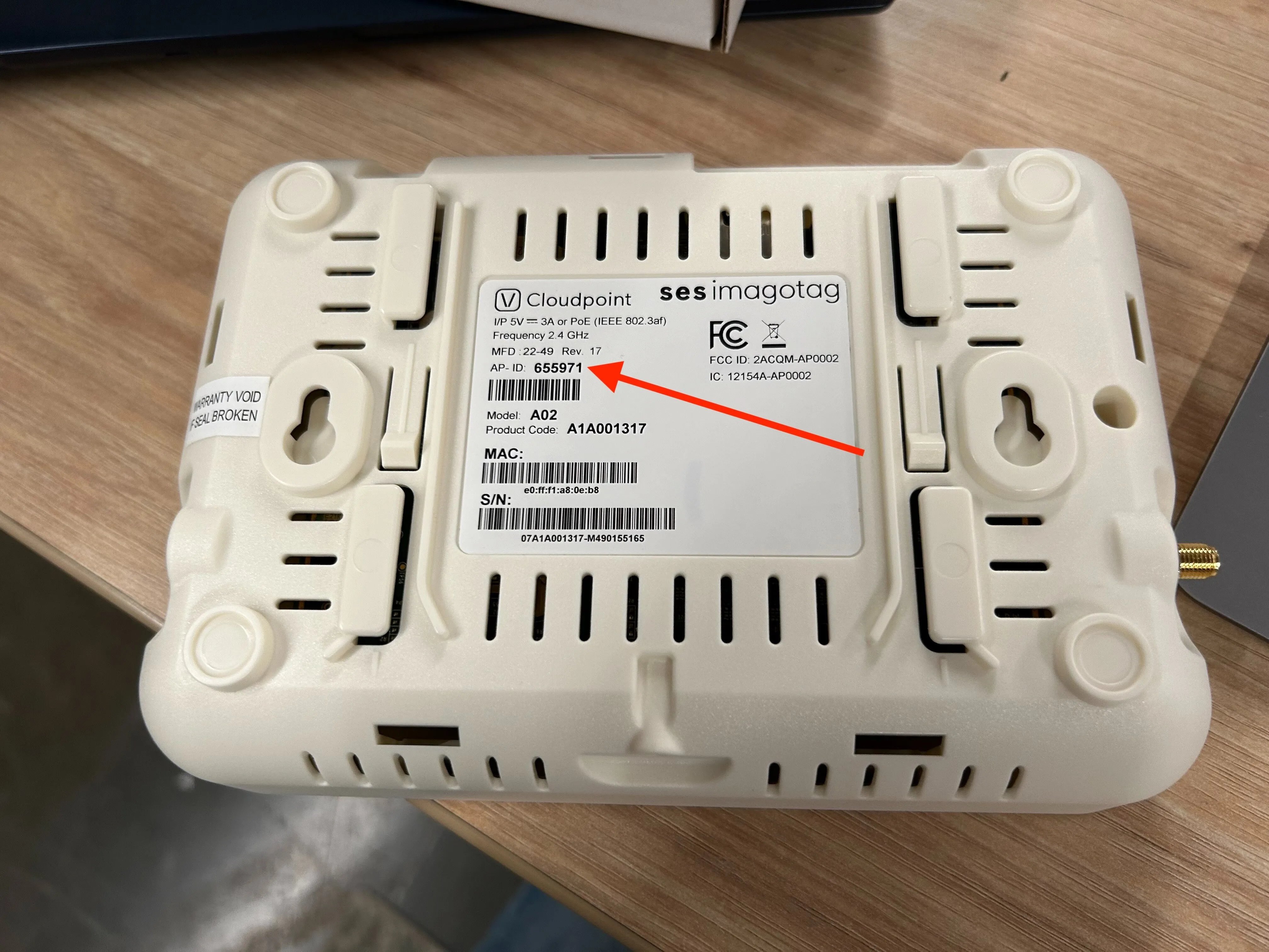 Label on the bottom of the access point with the AP-ID highlighted