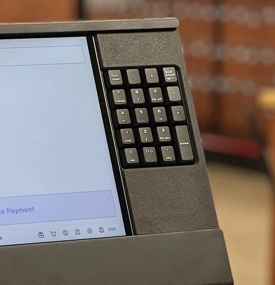 The 10-key cashier keyboard built into the right side of the cashier display