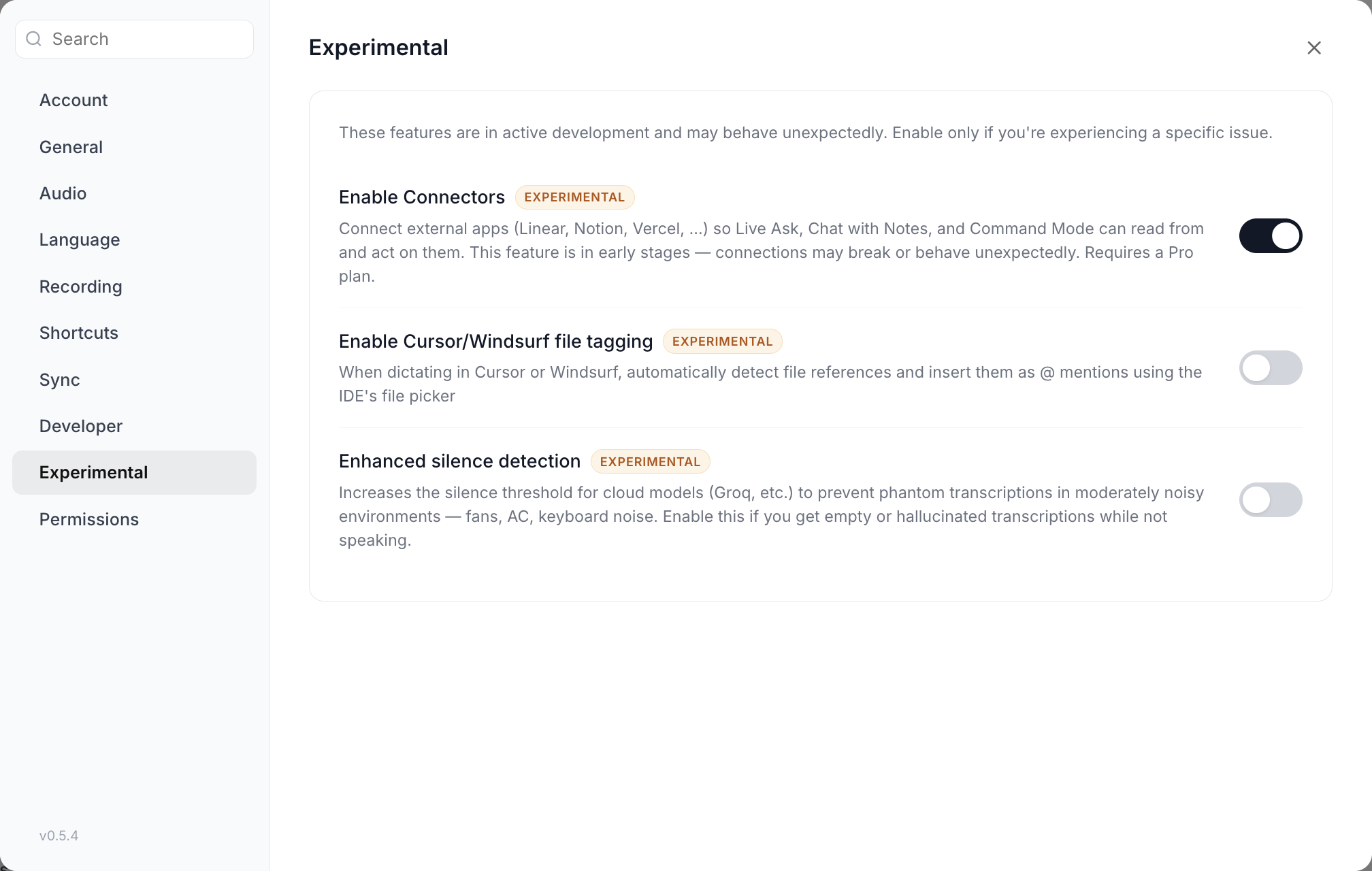 Settings > Experimental showing Enable Connectors, Enable Cursor/Windsurf file tagging and Enhanced silence detection