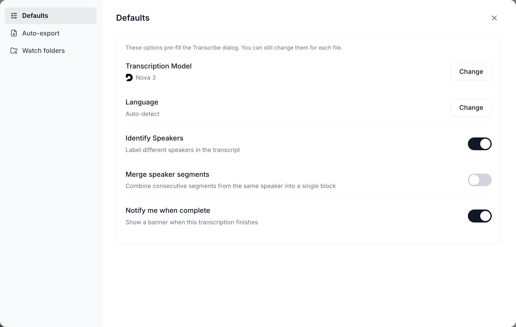The Transcribe settings modal on the Defaults tab, showing Transcription Model, Language, Identify Speakers, Merge speaker segments and Notify me when complete