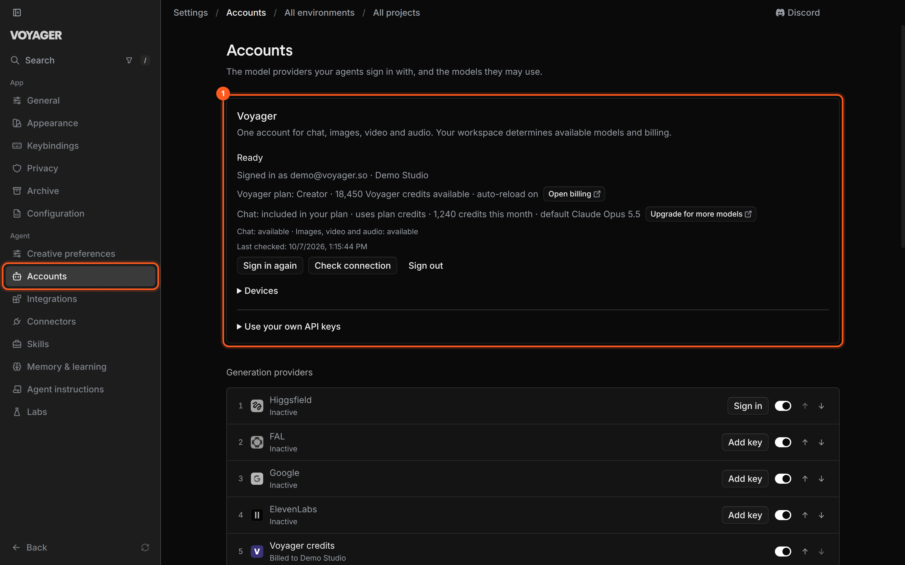 The Settings → Accounts page. The Voyager card shows Ready, the signed-in email and workspace, the plan line with available Voyager credits and an Open billing button, and a chat line with an Upgrade for more models button. Below it, the Generation providers list starts with Higgsfield, FAL, Google, ElevenLabs and Voyager credits, each with an on/off switch and up and down arrows.