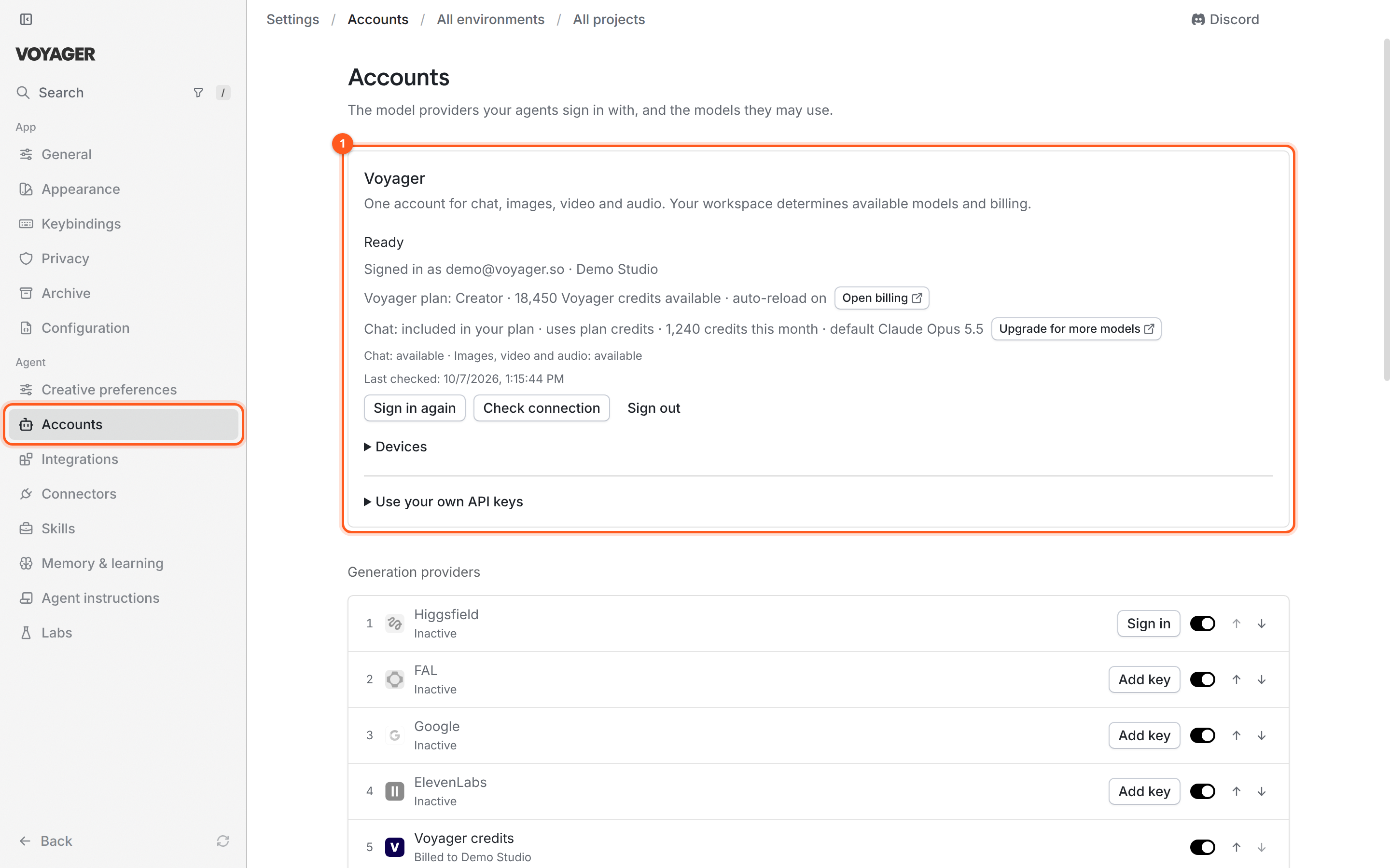 The Settings → Accounts page. The Voyager card shows Ready, the signed-in email and workspace, the plan line with available Voyager credits and an Open billing button, and a chat line with an Upgrade for more models button. Below it, the Generation providers list starts with Higgsfield, FAL, Google, ElevenLabs and Voyager credits, each with an on/off switch and up and down arrows.