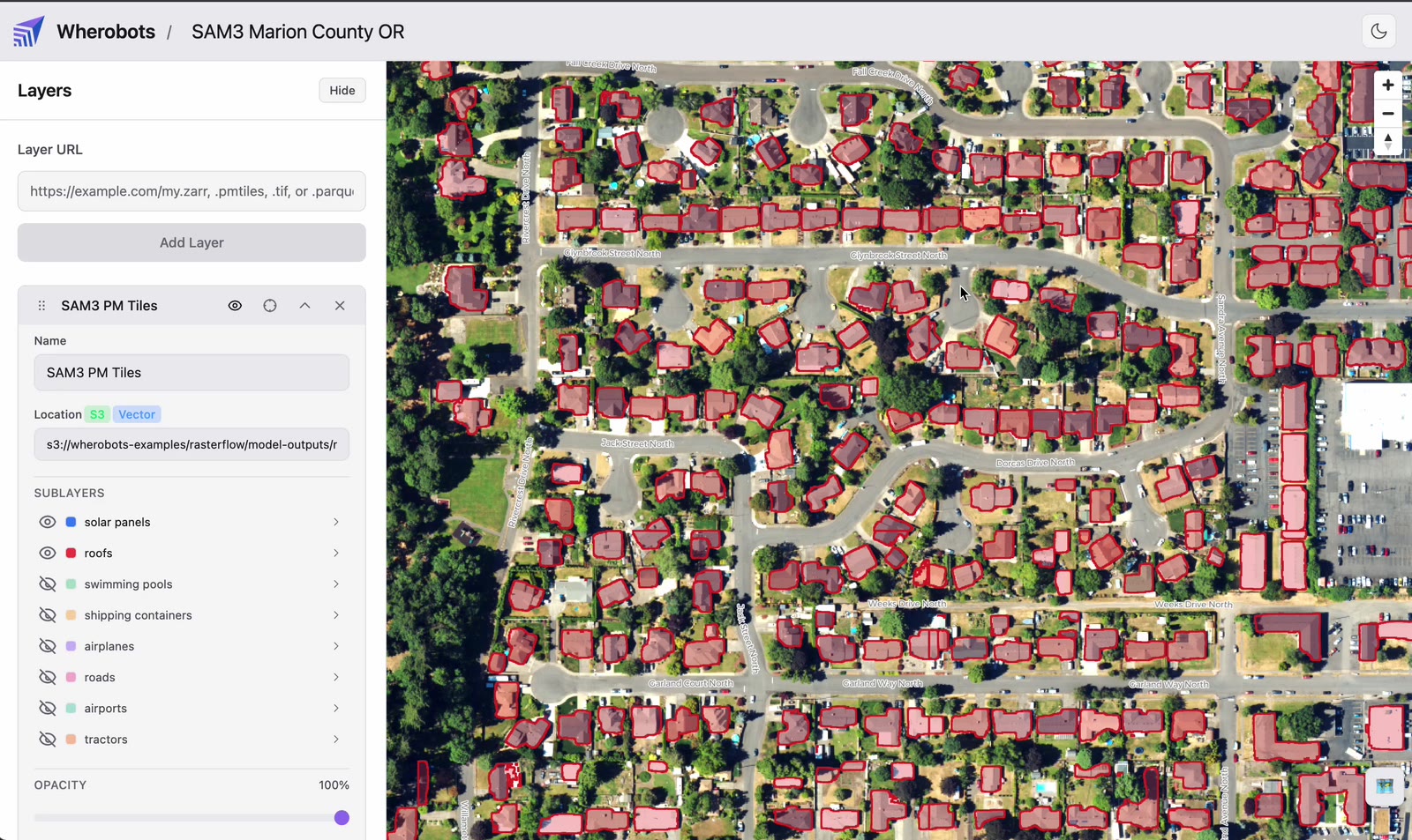 The Wherobots Cloud map viewer showing several hundred red roof polygons over 30 cm aerial imagery of a residential neighborhood, with a Layers panel on the left listing eight SAM3 sublayers, one per text prompt