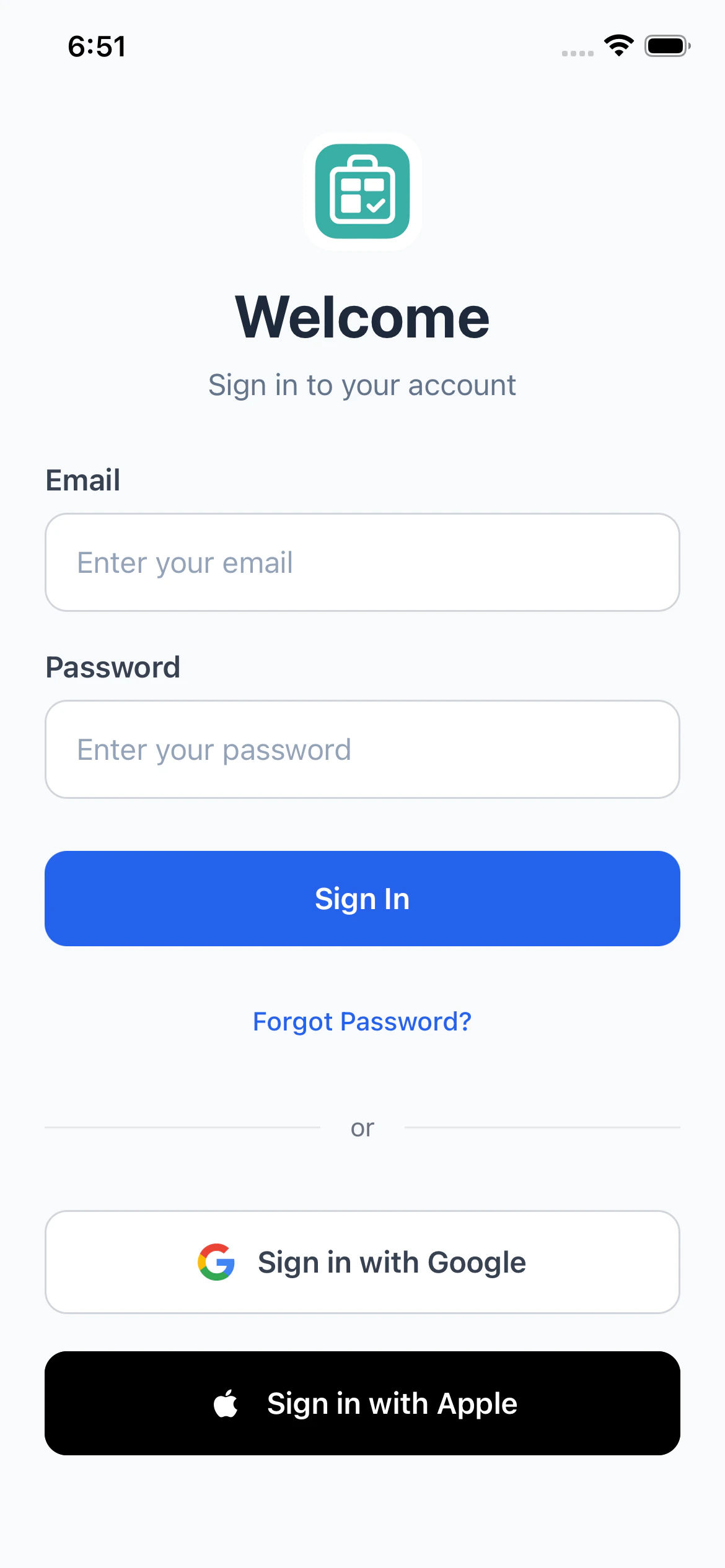 The PackKit welcome screen showing three sign-in options: Sign in with Apple, Sign in with Google, and an email and password form with a Create an account link below.