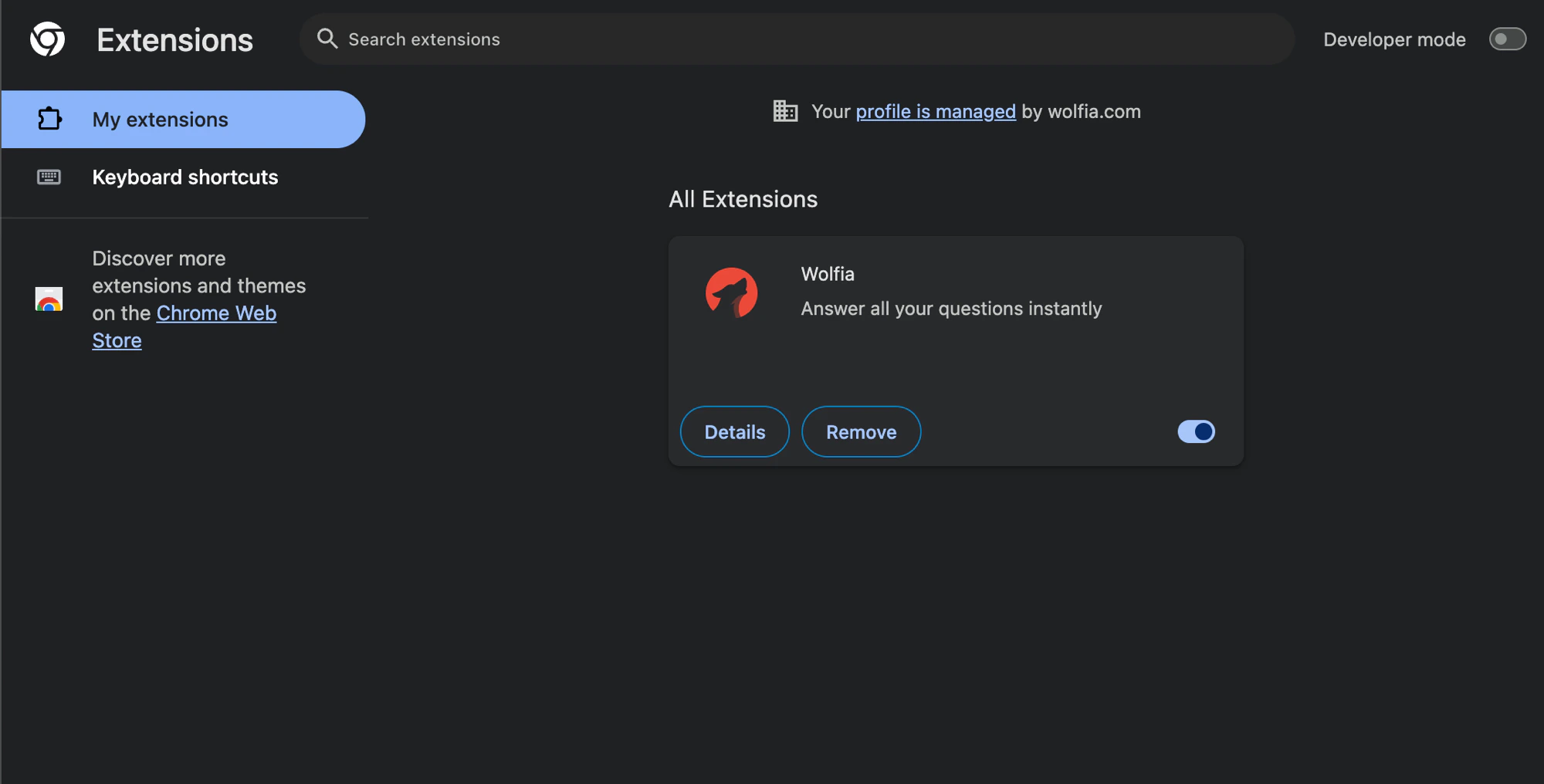 chrome://extensions page with the Wolfia card visible