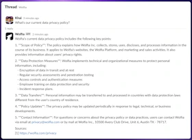 Wolfia answering in Slack with citations
