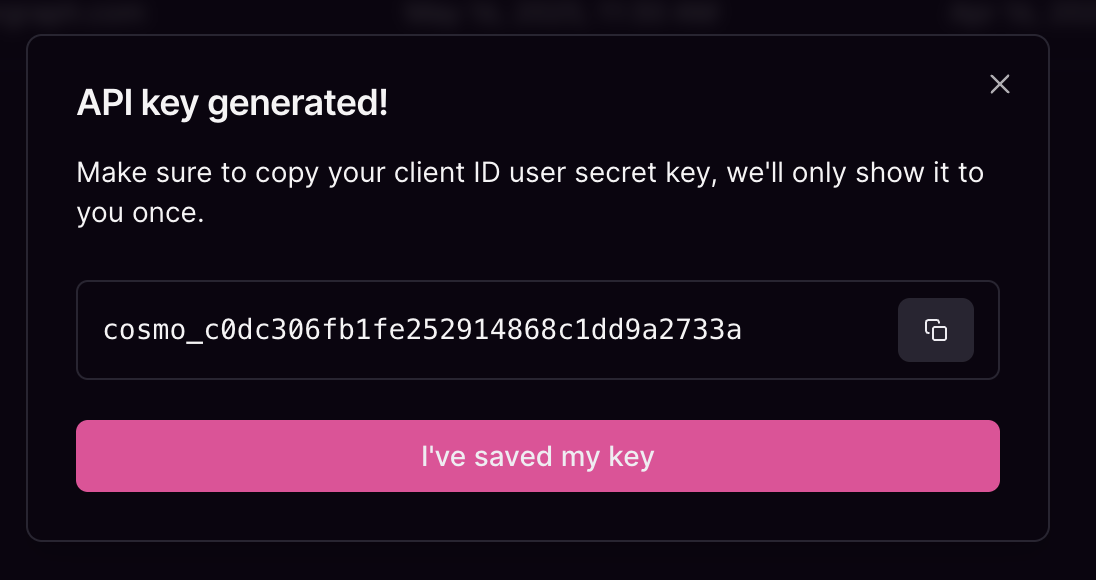API key generated prompt showing a one-time view of the new key with copy and confirmation options.